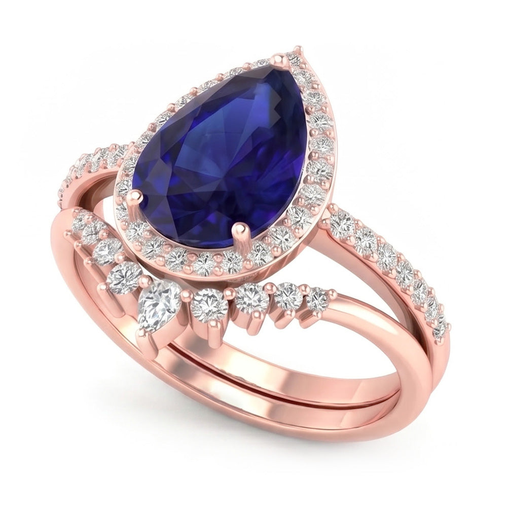 Fedi nuziali a forma di pera con zaffiro blu intenso e diamanti 4.50 carati