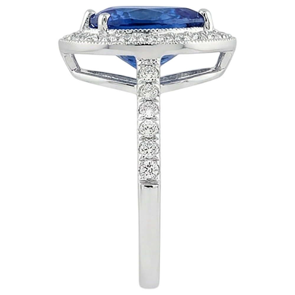 Fedi nuziali con tanzanite a pera e diamanti. gioielli in oro 2.25 carati