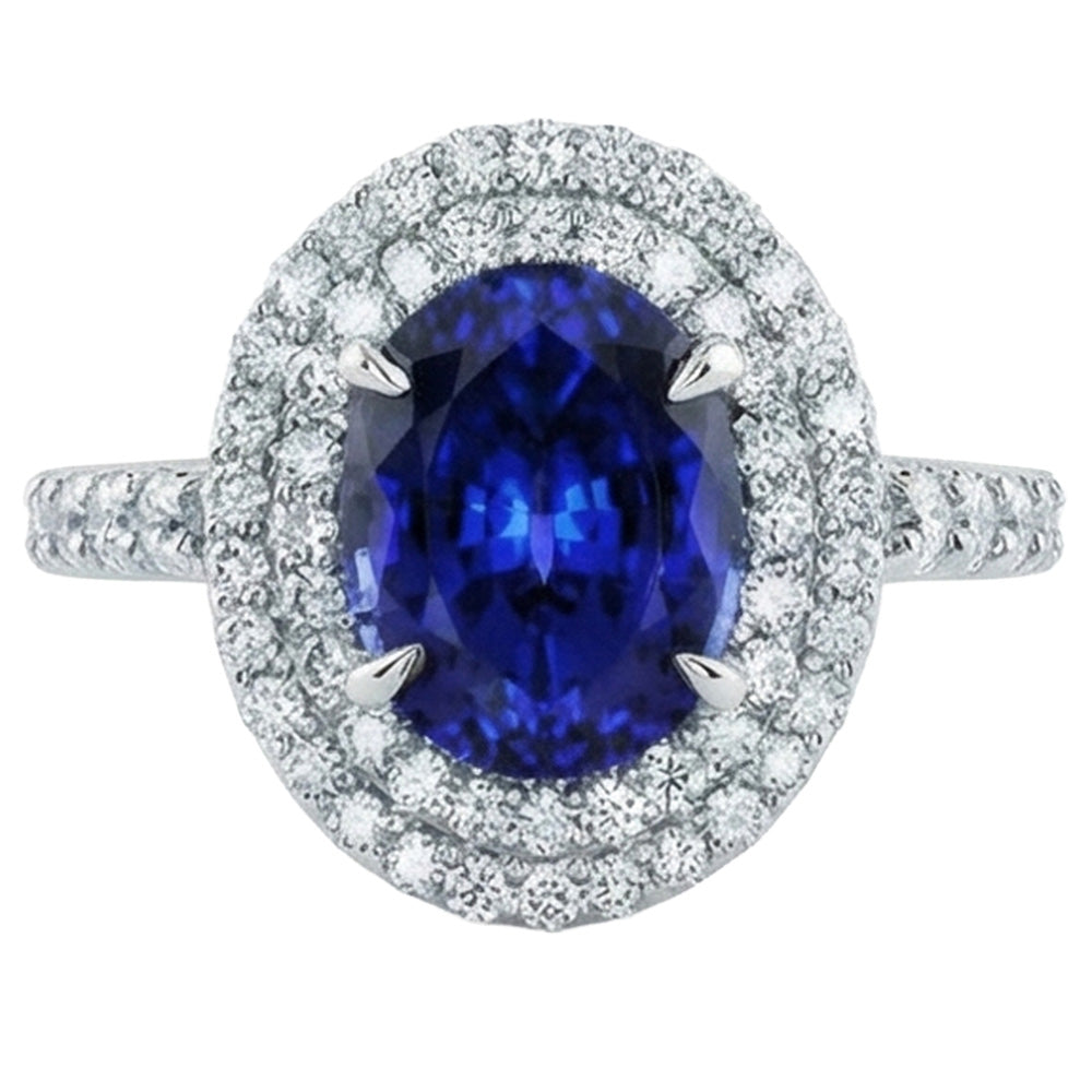 Grande anello ovale con zaffiro blu dello Sri Lanka e diamante. oro bianco da 4.55 ct. 14K