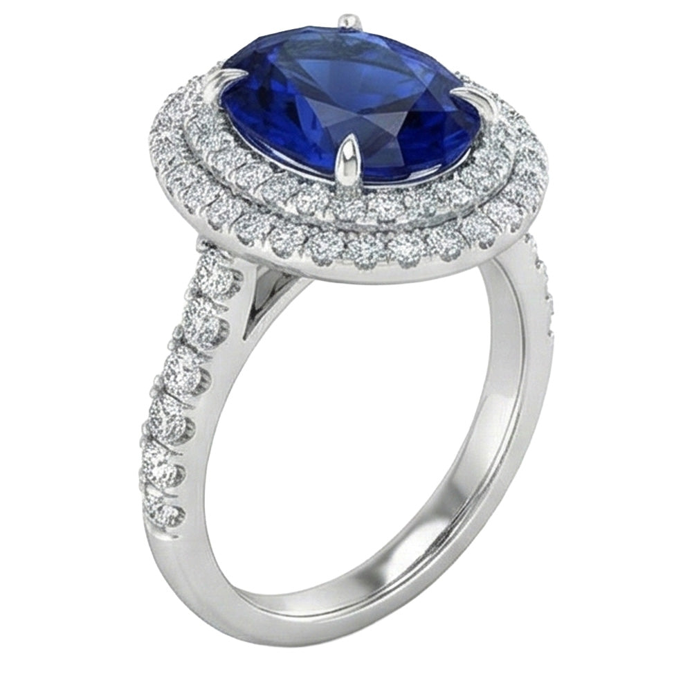 Grande anello ovale con zaffiro blu dello Sri Lanka e diamante. oro bianco da 4.55 ct. 14K