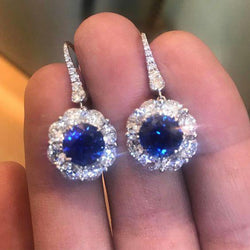 Orecchino pendente con zaffiri dello Sri Lanka taglio rotondo 2,50 ct e diamanti e oro bianco 14K