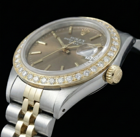Orologio Rolex Date con quadrante champagne e lunetta in diamanti. Orologio in acciaio inossidabile e Giubileo