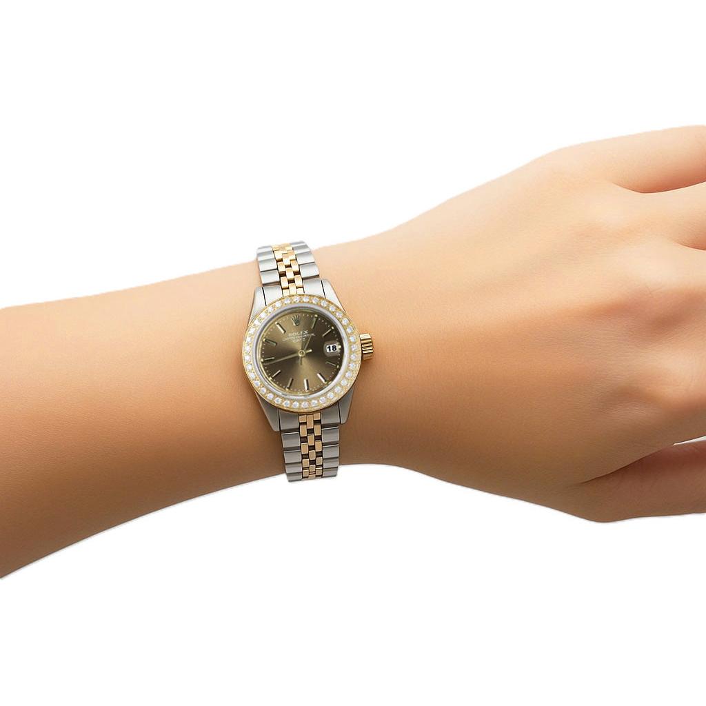 Orologio Rolex Date con quadrante champagne e lunetta in diamanti. Orologio in acciaio inossidabile e Giubileo P1