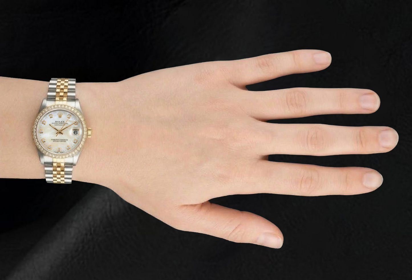 Orologio Rolex Datejust anno 2000 con quadrante in madreperla bianca e diamanti, cassa bicolore da 31 mm.