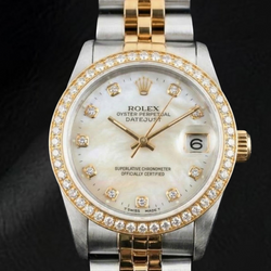 Orologio Rolex Datejust anno 2000 con quadrante in madreperla bianca e diamanti, cassa bicolore da 31 mm.