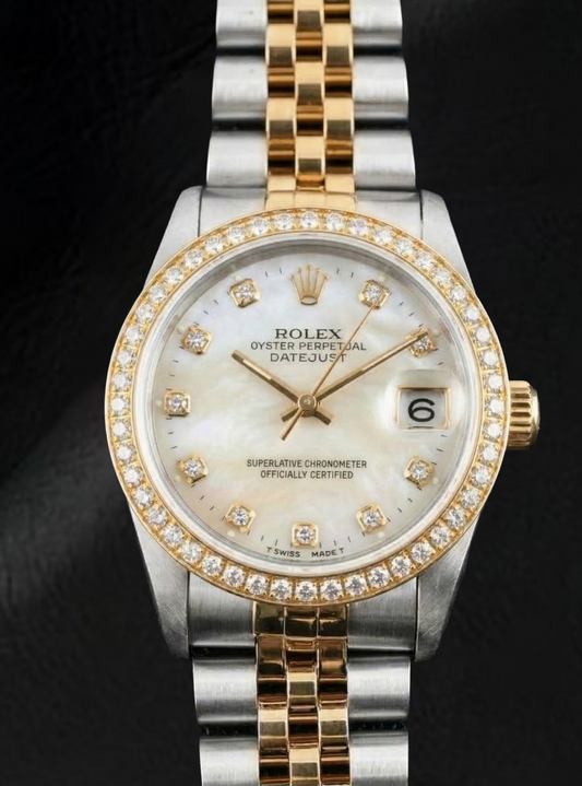 Orologio Rolex Datejust anno 2000 con quadrante in madreperla bianca e diamanti, cassa bicolore da 31 mm.