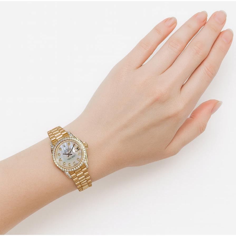 Orologio Rolex Datejust in oro giallo con quadrante con lunetta in diamanti President P1