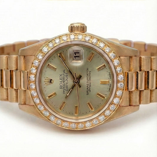Orologio Rolex Datejust in oro giallo stile presidenziale con quadrante grigio a bastoncino e diamanti