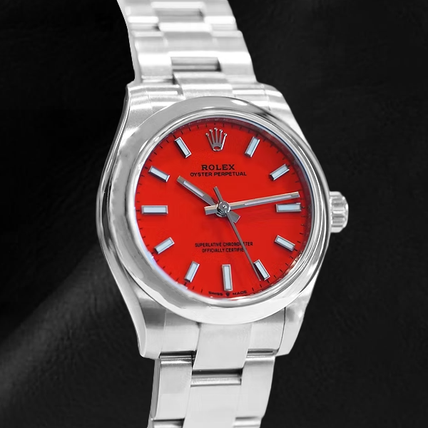 Orologio Rolex Ostrica perpetual corallo rosso quadrante luminoso in acciaio