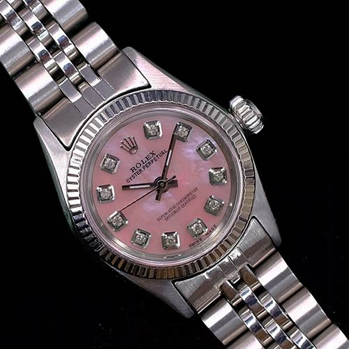 Orologio Rolex Oyster Perpetual in acciaio inossidabile con lunetta scanalata e quadrante con diamanti