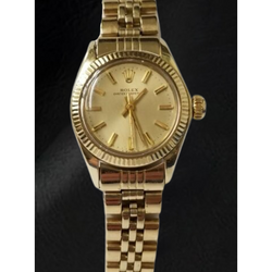 Orologio Rolex Oyster Perpetual da 24 mm con quadrante champagne e oro giallo