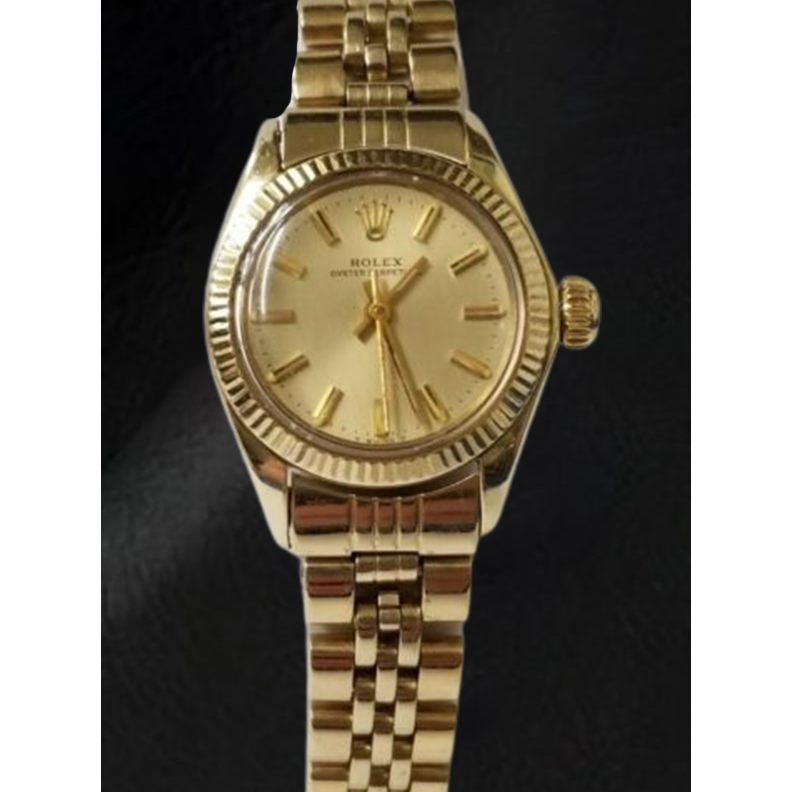 Orologio Rolex Oyster Perpetual da 24 mm con quadrante champagne e oro giallo