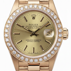 Orologio Rolex champagne bastone quadrante presidente Datejust lunetta diamanti oro giallo