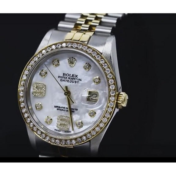 Orologio Rolex con data e lunetta 
