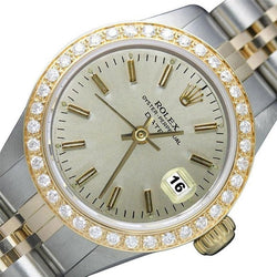 Orologio Rolex con lunetta in diamanti e quadrante bianco a bastoncino, bracciale giubileo bicolore