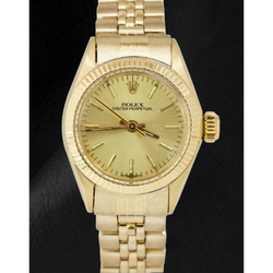 Orologio Rolex in oro giallo con quadrante champagne da 24 mm