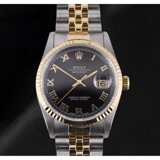 Orologio da donna Rolex Datejust 31 mm bicolore con quadrante nero e numeri romani.