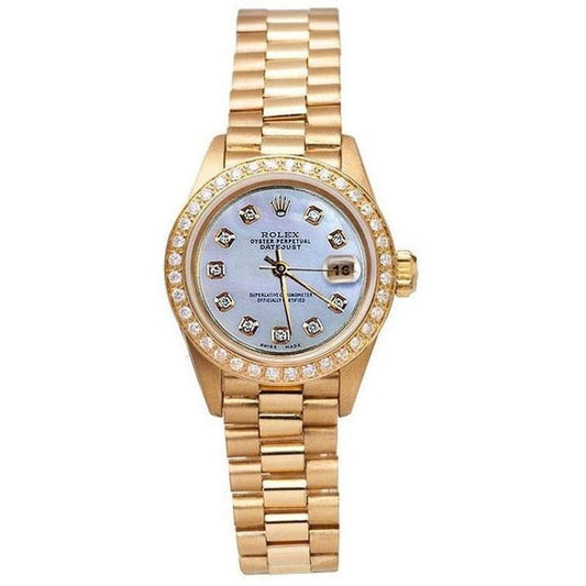 Orologio da donna in oro giallo con quadrante in madreperla e diamanti
