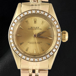 Orologio da donna Rolex Oyster Perpetual con lunetta in oro giallo e diamanti