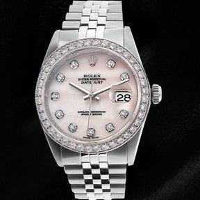 Quadrante rosa in madreperla con diamanti