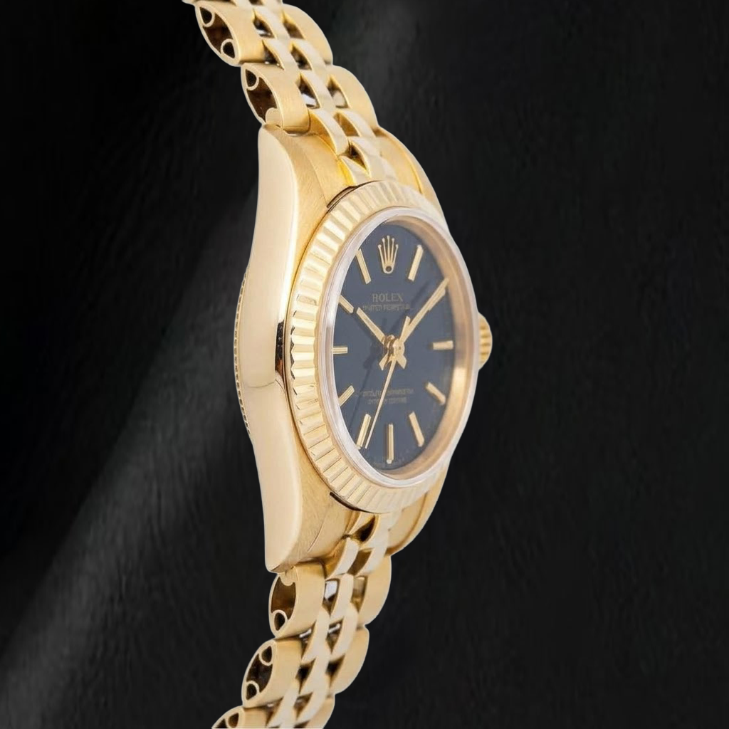 Rolex 67197 Oyster Perpetual Quadrante Nero con Indici a Bastone 24mm Oro Giallo Orologio da Donna