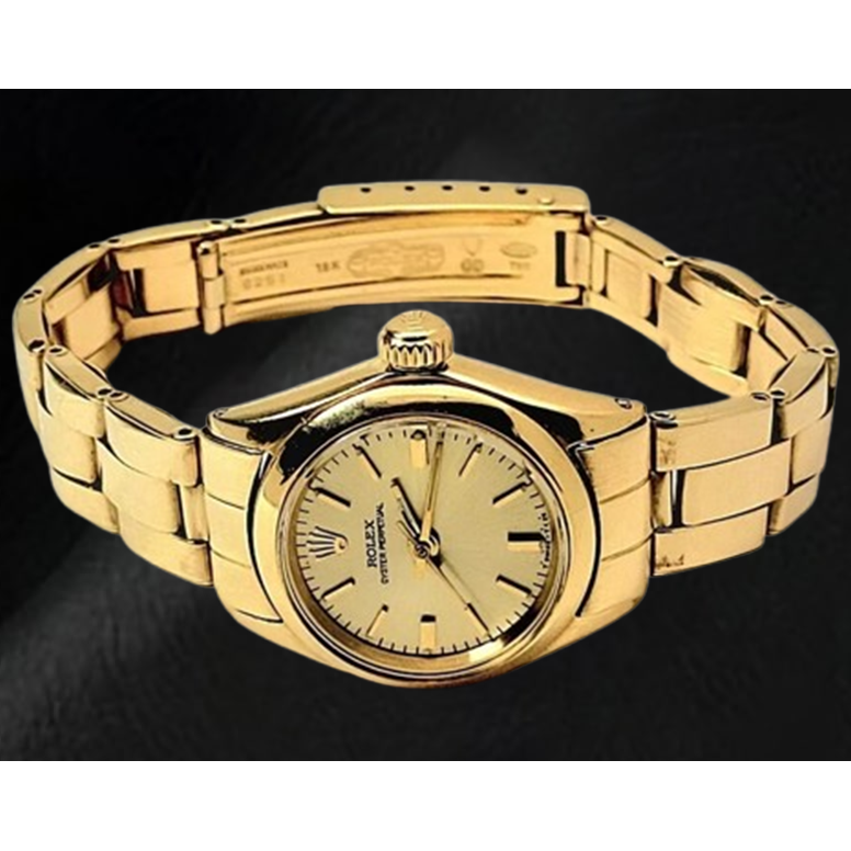 Rolex Oyster Perpetual 24 mm Orologio con quadrante a bastoncino champagne Bracciale Oyster in oro giallo