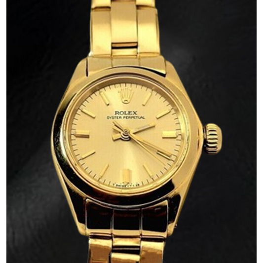 Rolex Oyster Perpetual 24 mm Orologio con quadrante a bastoncino champagne Bracciale Oyster in oro giallo