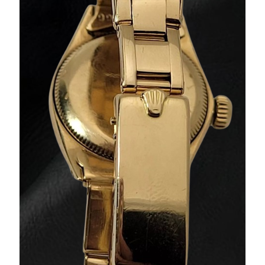 Rolex Oyster Perpetual 24 mm Orologio con quadrante a bastoncino champagne Bracciale Oyster in oro giallo