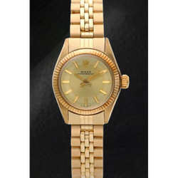 Rolex Oyster Perpetual 24 mm Orologio in oro giallo con quadrante champagne