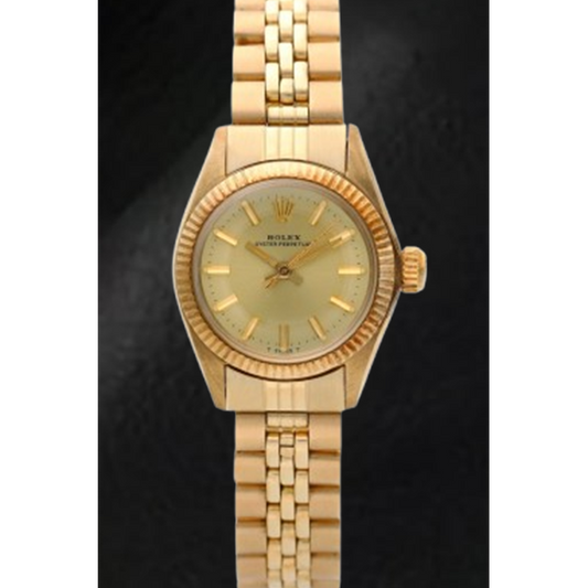 Rolex Oyster Perpetual 24 mm Orologio in oro giallo con quadrante champagne
