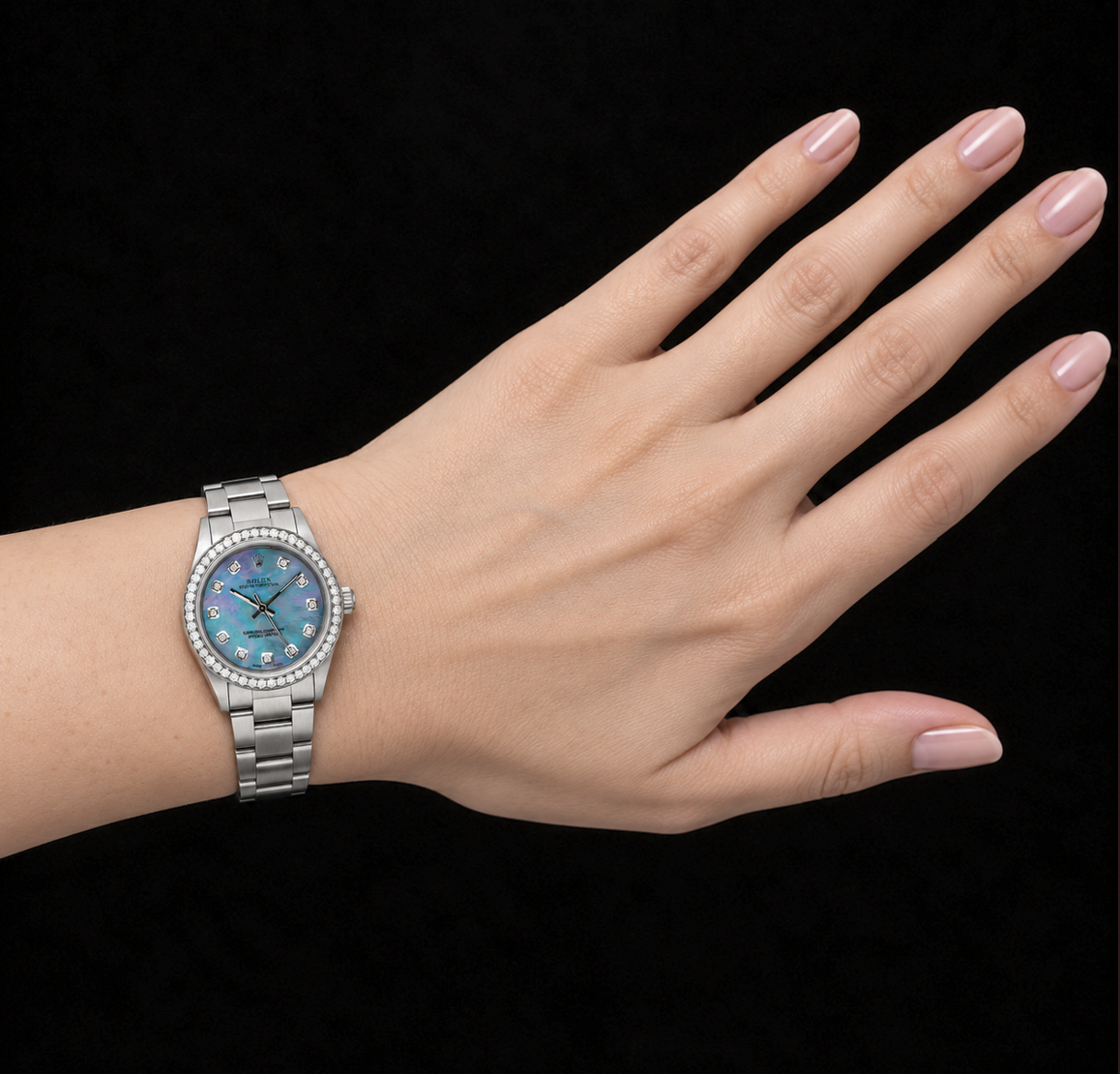 Rolex Oyster Perpetual 67480 31 mm Quadrante con Diamanti in Madreperla Blu Acciaio Inossidabile