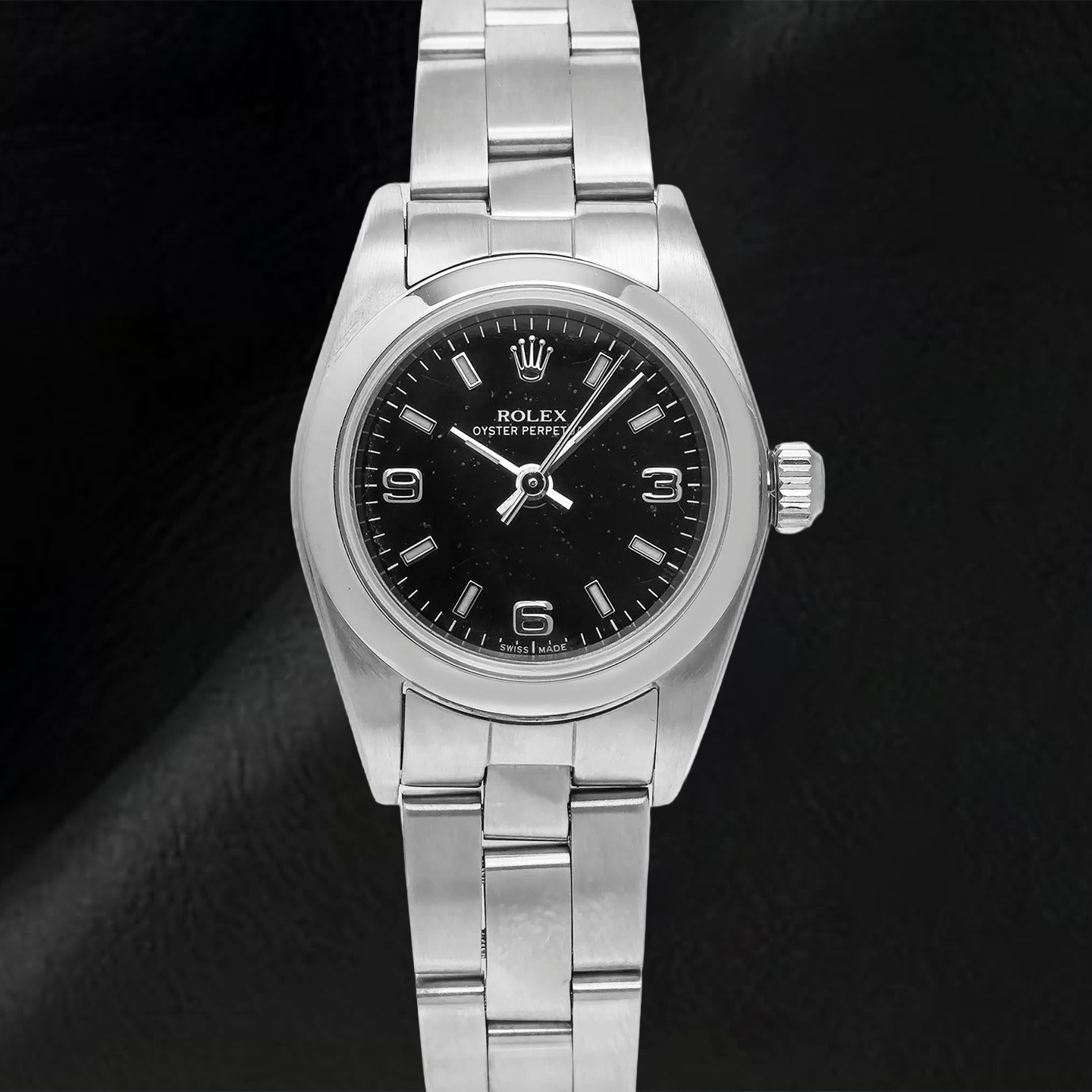 Orologio Rolex Oyster Perpetual 76094 26 mm Quadrante Nero con Numeri Arabi Bracciale Oyster in Acciaio Inossidabile