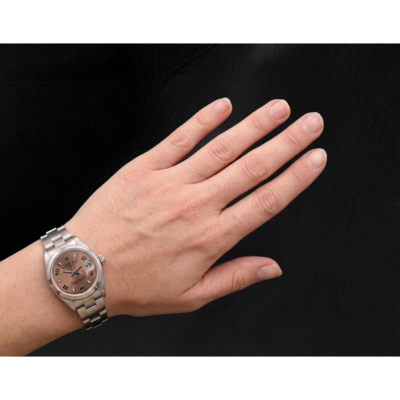 Orologio Rolex Oyster Perpetual da donna 26 mm anno 2002 quadrante rosa con numeri arabi