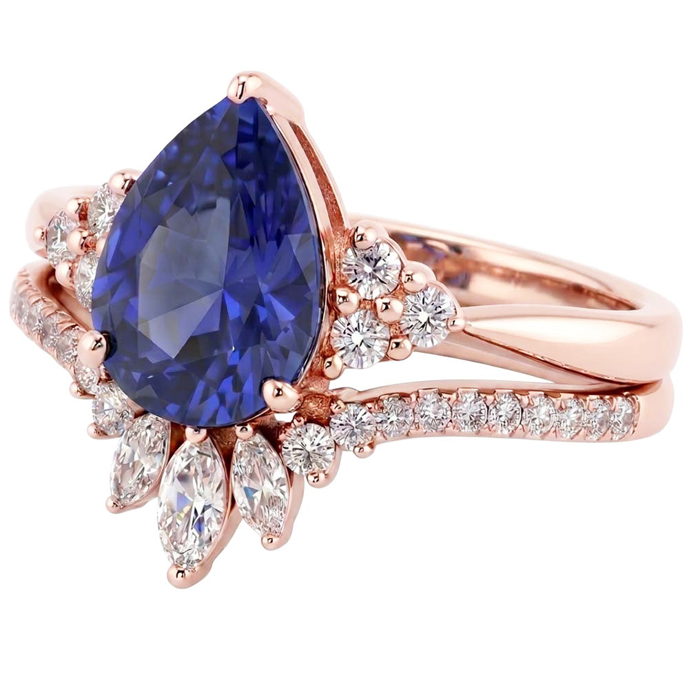 Set di fedi nuziali con zaffiro blu marquise da 4 carati e diamanti tondi