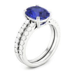 Set di fedi nuziali da donna in oro con diamanti e zaffiro blu ovale. 4.50 carati
