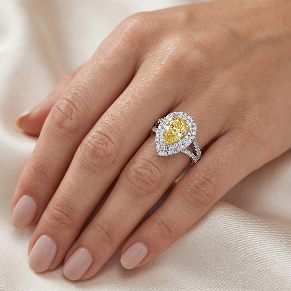 Sofisticato Anello Halo con Diamante Giallo Fancy Purezza VVS