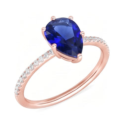 Solitario con pietra preziosa. anello con zaffiro blu e pavé di diamanti. 3.50 carati