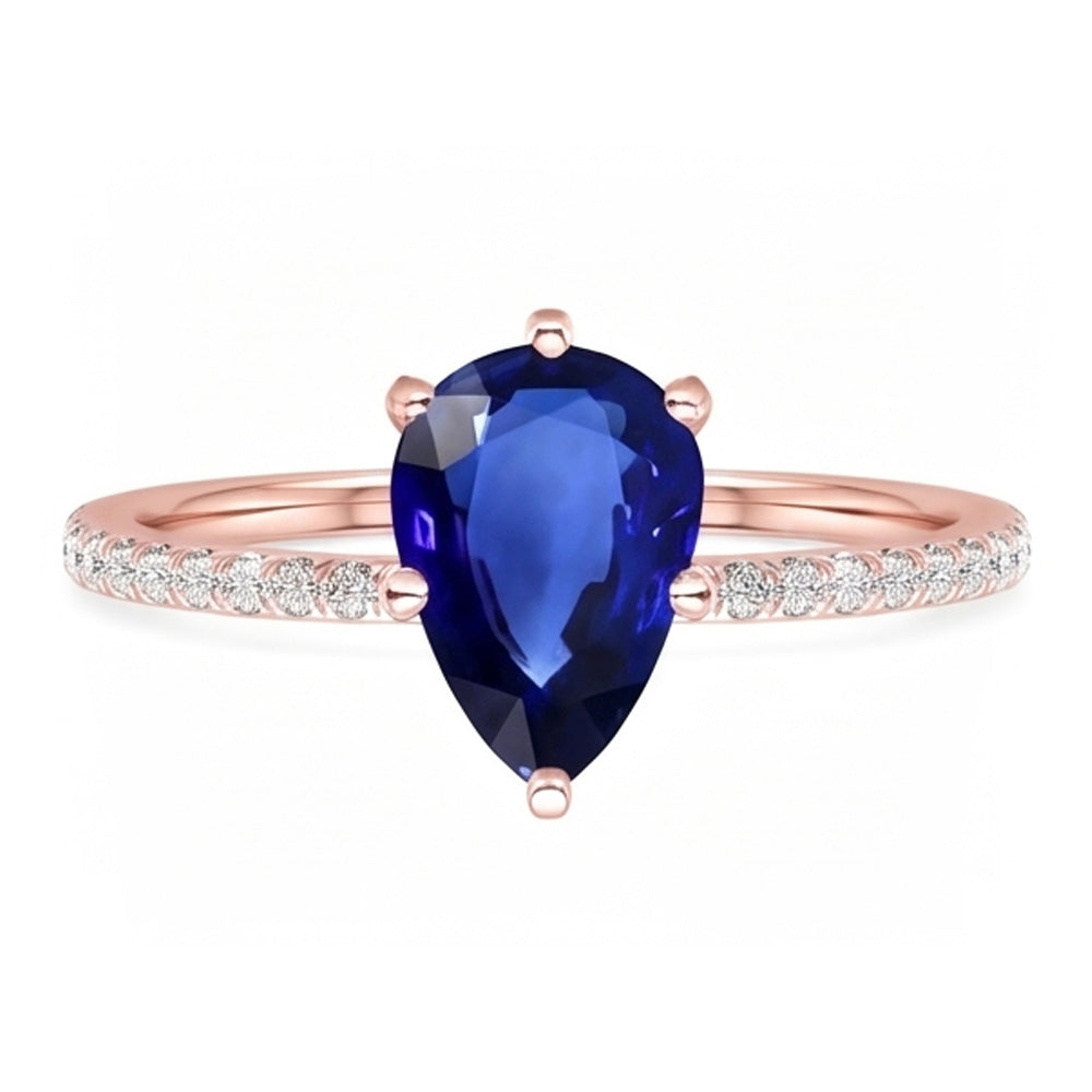 Solitario con pietra preziosa. anello con zaffiro blu e pavé di diamanti. 3.50 carati