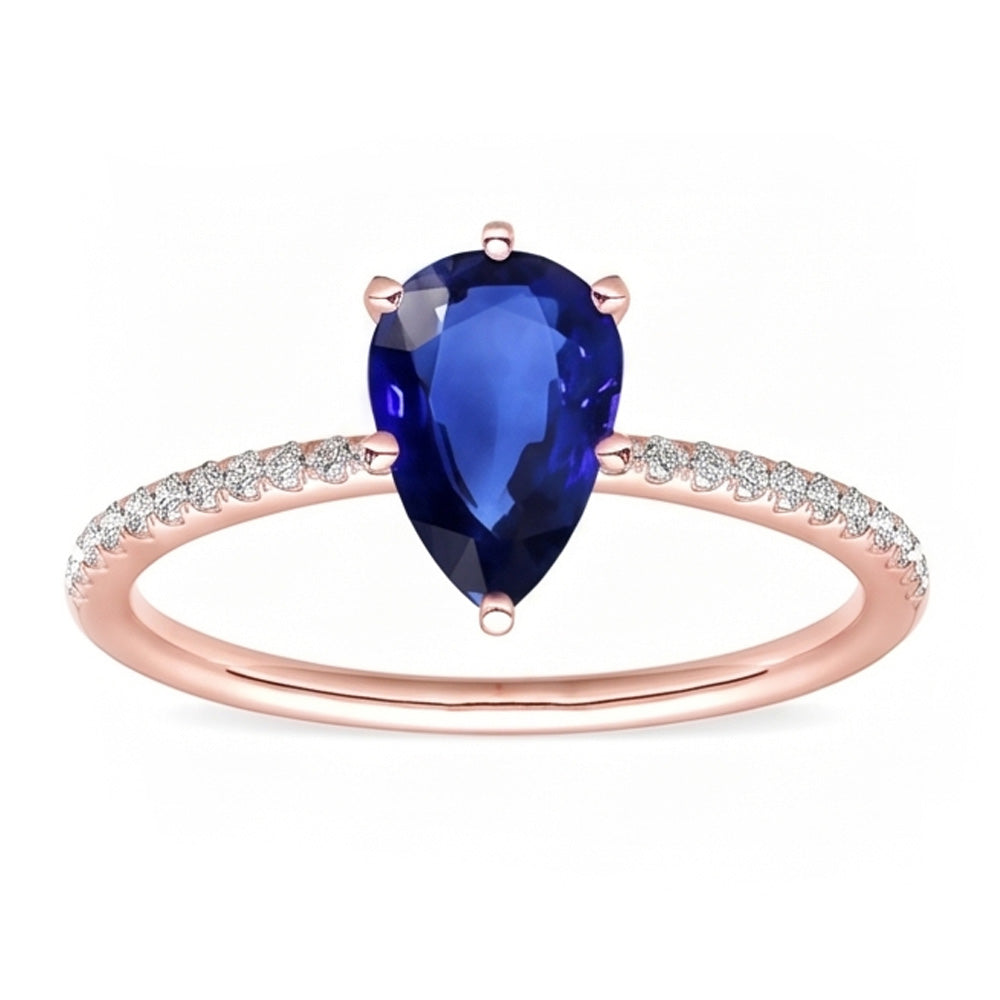 Solitario con pietra preziosa. anello con zaffiro blu e pavé di diamanti. 3.50 carati