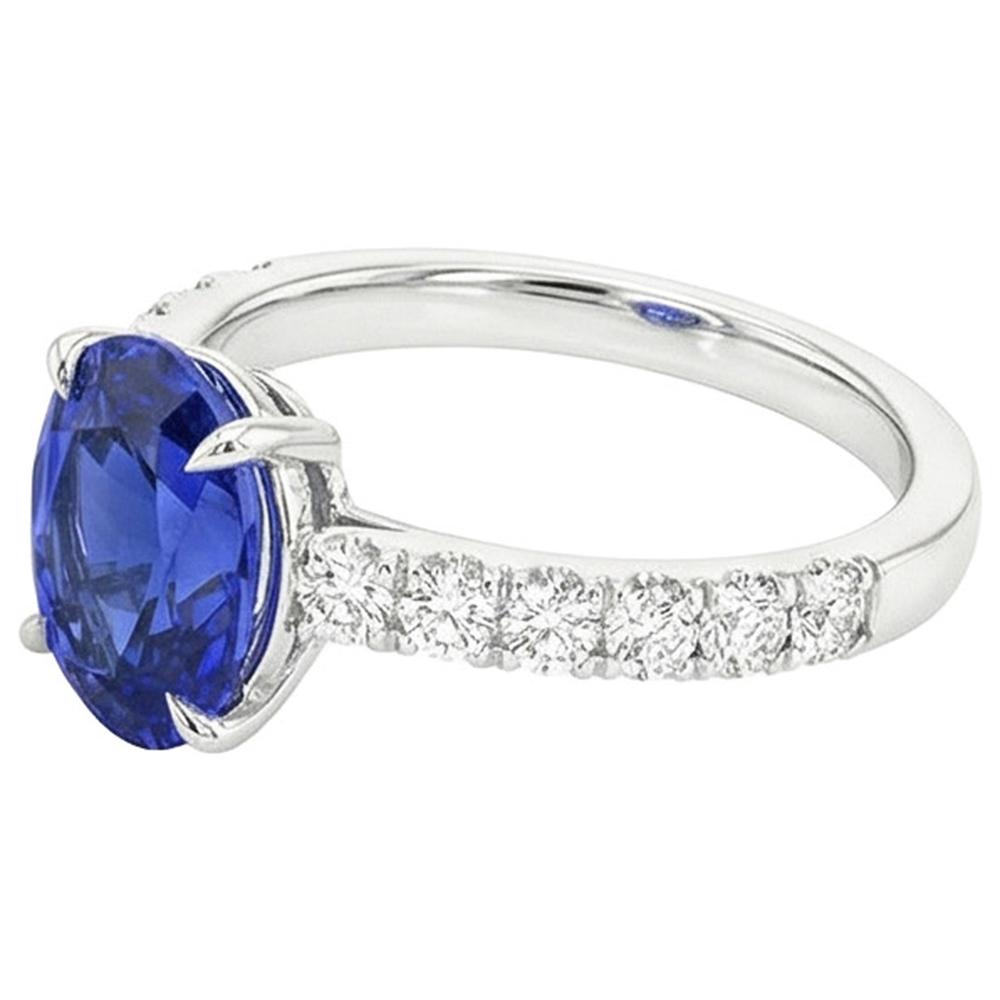 Solitario da donna con accenti Anello zaffiro blu e diamanti 4 carati