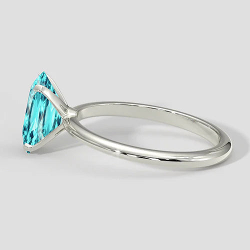 Solitario a quattro punte con tormalina Paraiba ovale da 3 ct