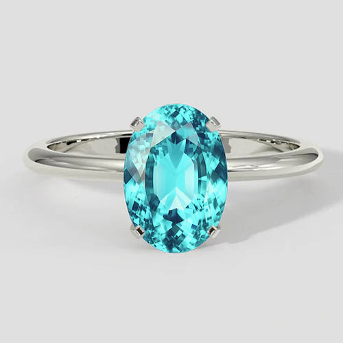 Solitario a quattro punte con tormalina Paraiba ovale da 3 ct