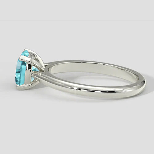 Solitario con tormalina Paraiba a cuscino vibrante da 1,25 ct