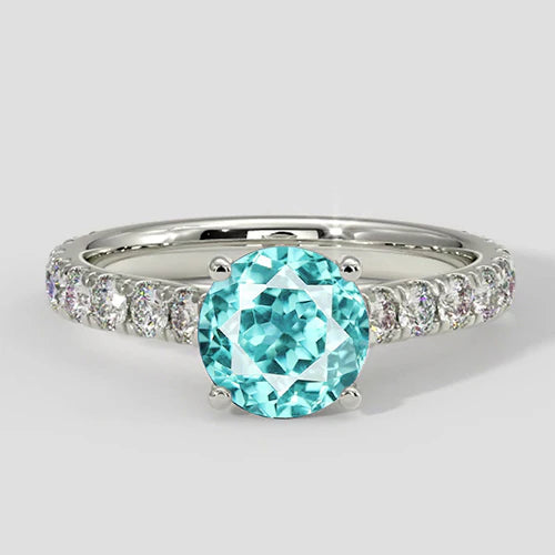 Solitario in tormalina Paraiba con fascia in pavé di diamanti