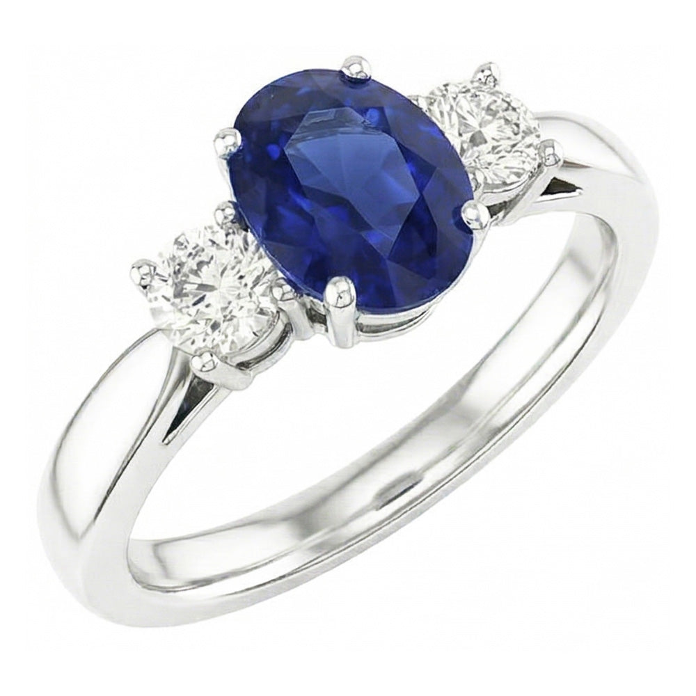 Zaffiro ovale. tre pietre rotonde. anello di diamanti. 2 carati. oro 14K