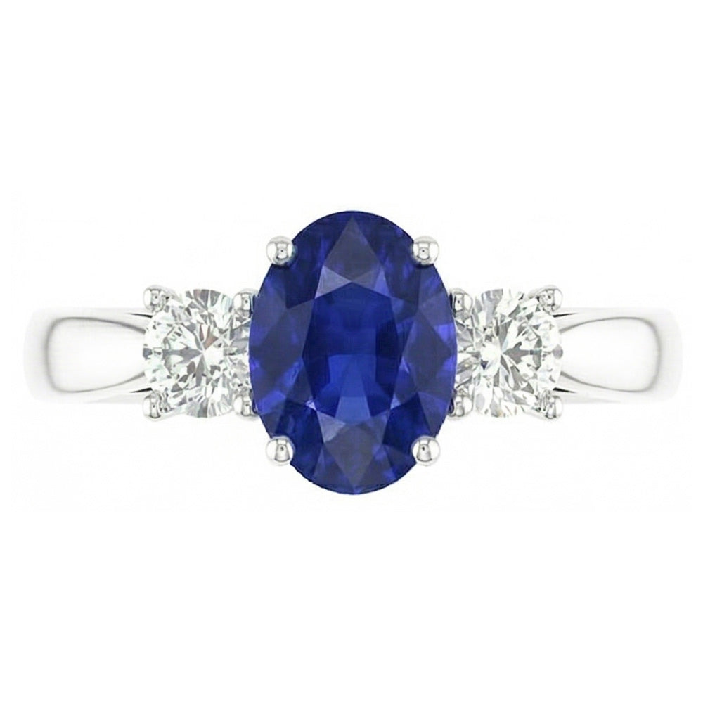 Zaffiro ovale. tre pietre rotonde. anello di diamanti. 2 carati. oro 14K