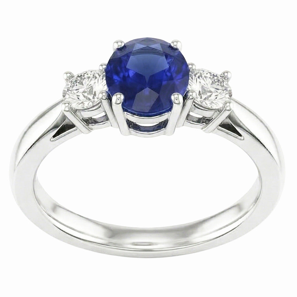 Zaffiro ovale. tre pietre rotonde. anello di diamanti. 2 carati. oro 14K