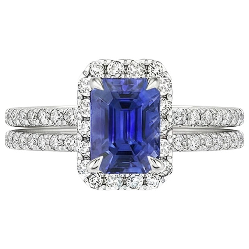 anello alone con zaffiro blu smeraldo 5 carati e diamante oro bianco 14K