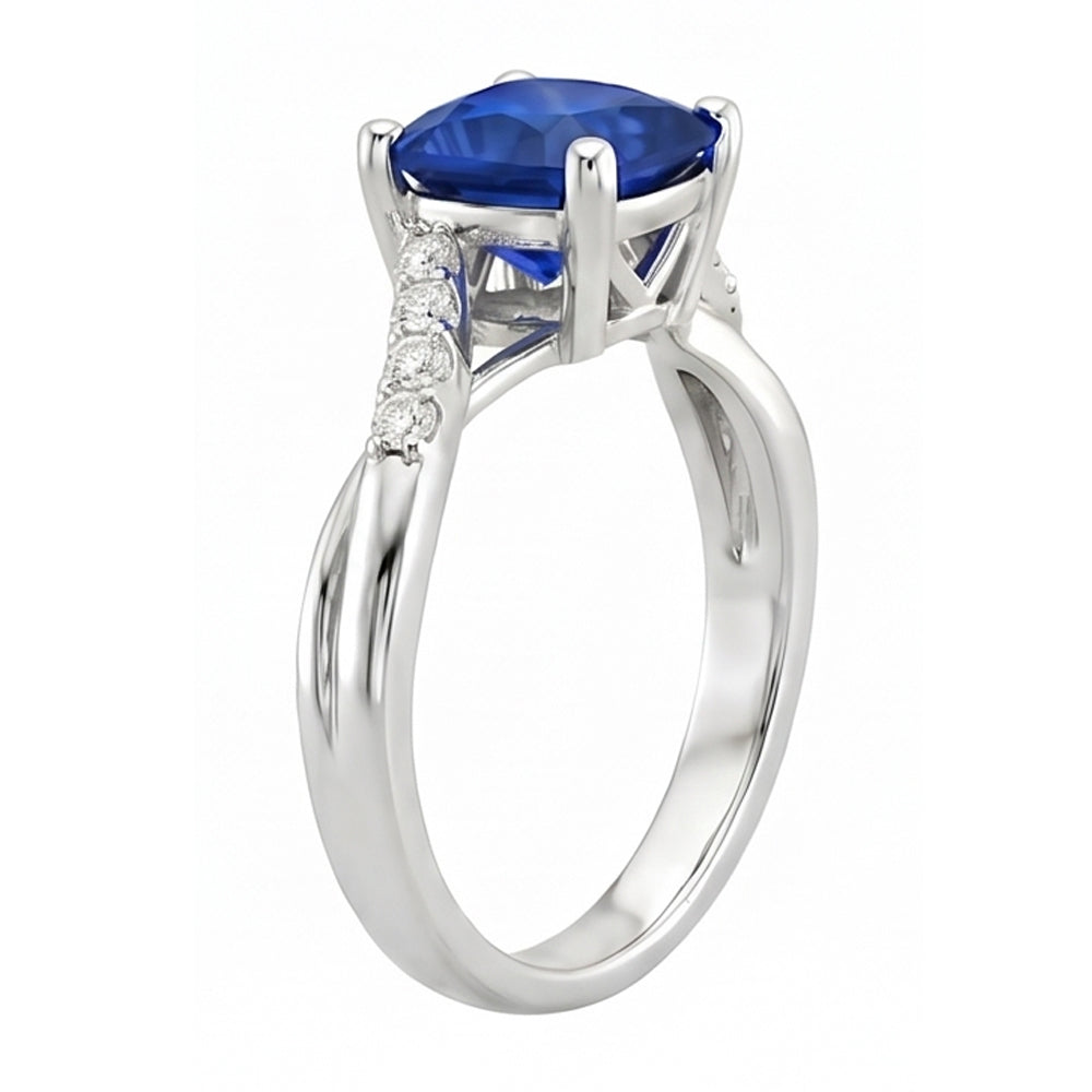 anello solitario con zaffiro blu 2,50 carati e accenti di diamante cuscino in oro bianco 14 carati
