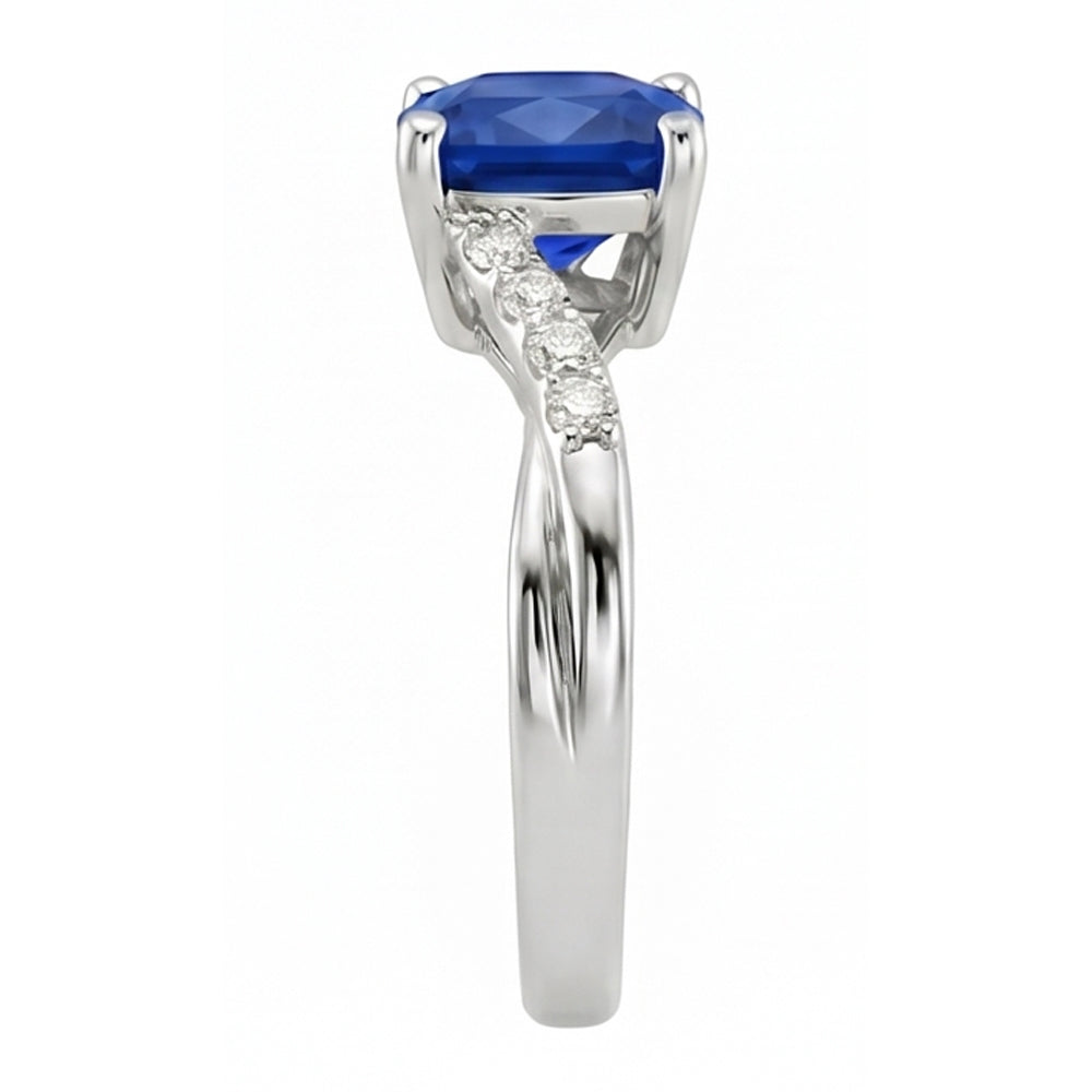 anello solitario con zaffiro blu 2,50 carati e accenti di diamante cuscino in oro bianco 14 carati